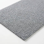 Self-adhesive anti-slip protective floor mat