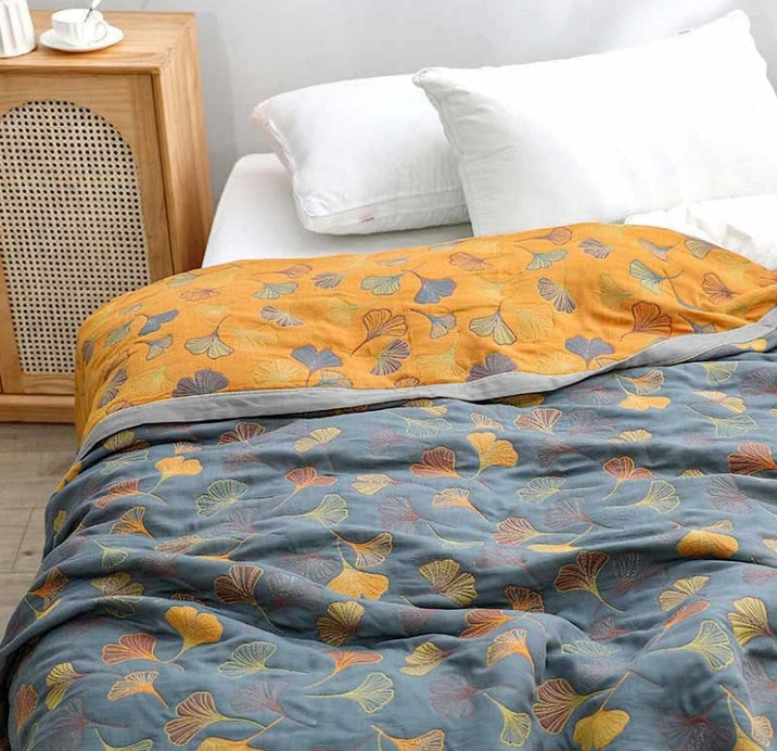 Colorful reversible quilted floral bedspread