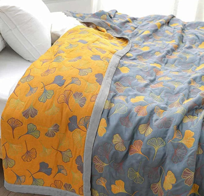 Colorful reversible quilted floral bedspread